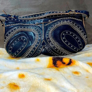 Cole Haan embroidered hand bag